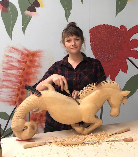 Olivia O'Connor, woodcarver and artist with sculpture art