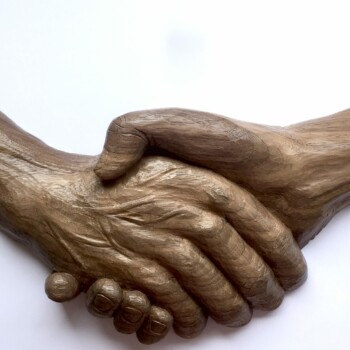 Father and Daughter Handshake #1 woodcarving by Olivia O'Connor