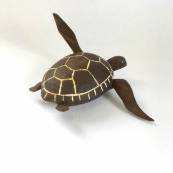 Turtle with gold leaf sculpture art by Olivia O'Connor