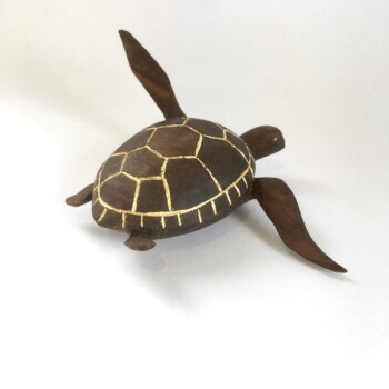 Turtle with gold leaf sculpture art by Olivia O'Connor